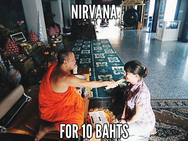 Bangkok travel meme: A monk and traveler at Wat Pho